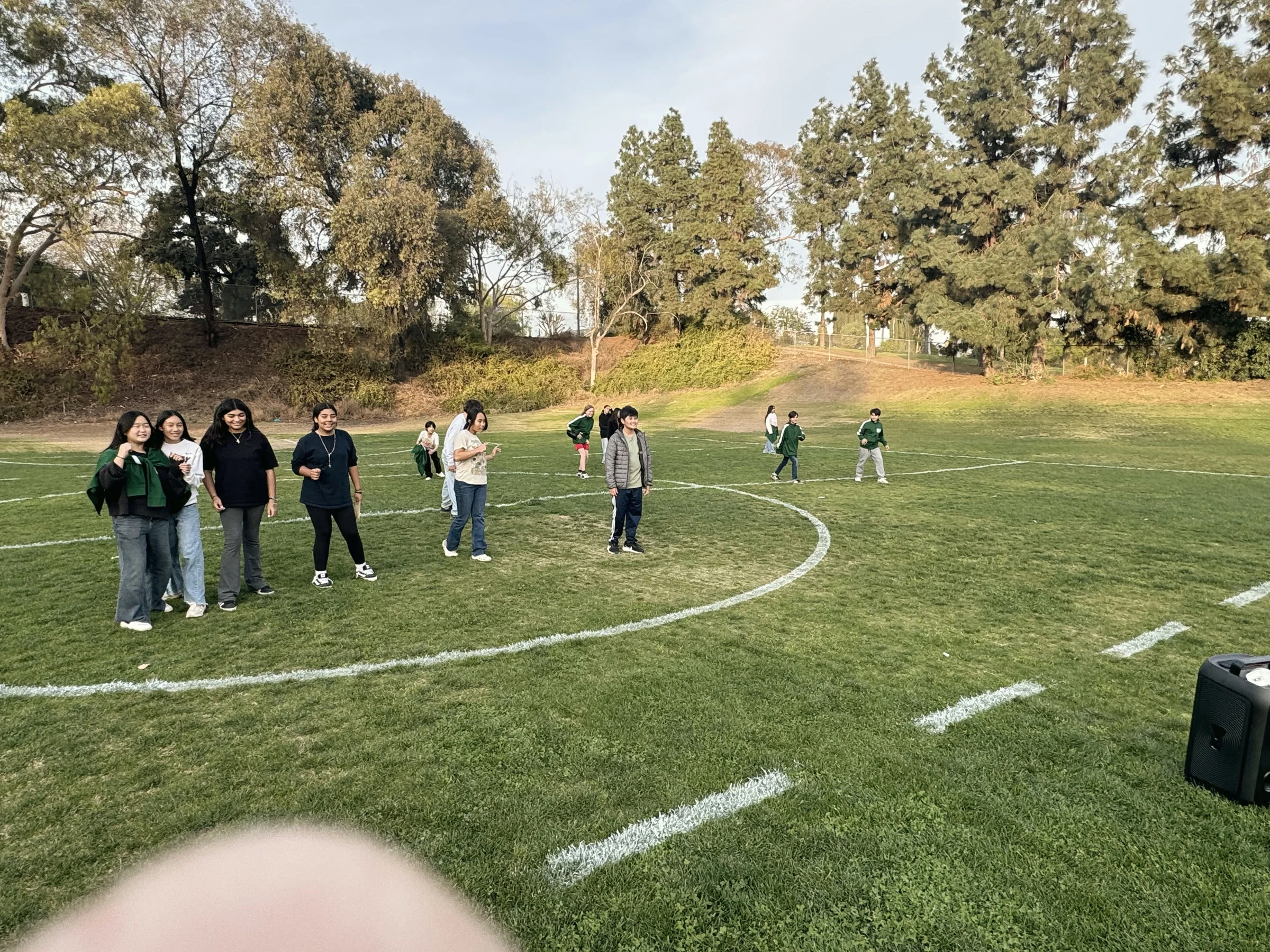 Students outdoors on sports field